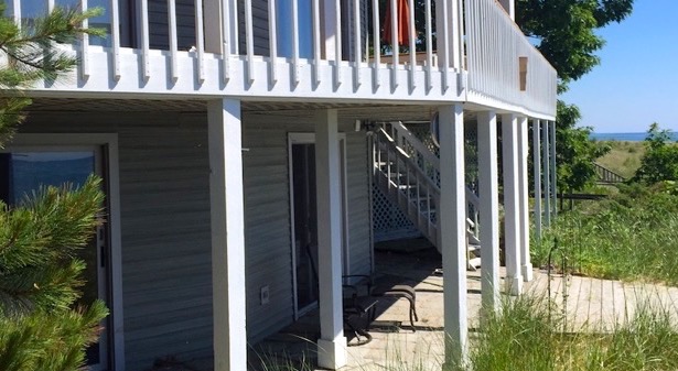 a lakefront home's porch in Shelby, MI was in need of repair.