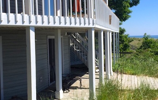 This lakefront home's porch was sinking due to the soil composition.