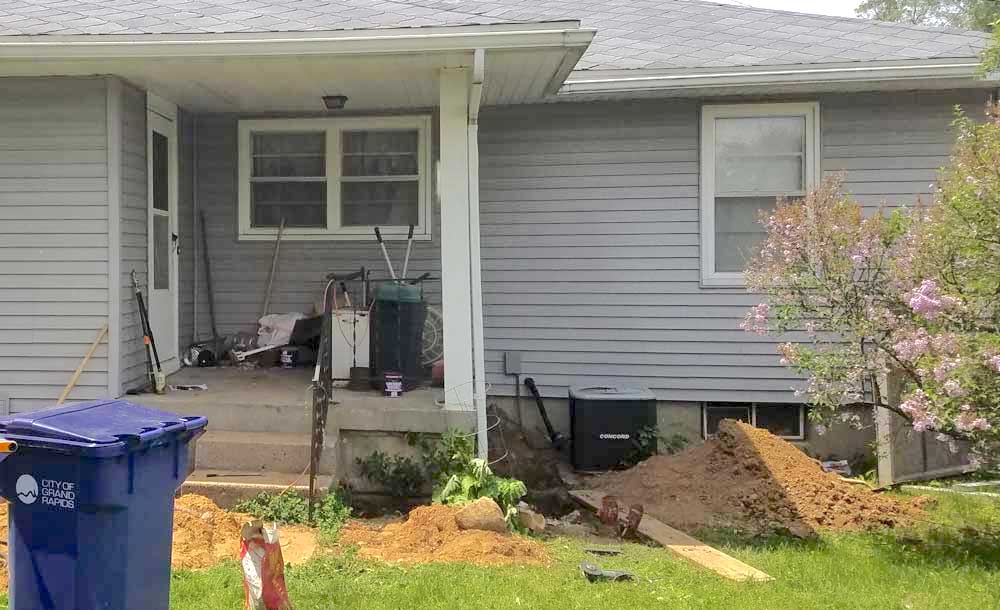 Grand Rapids MI sunken porch raising job site.