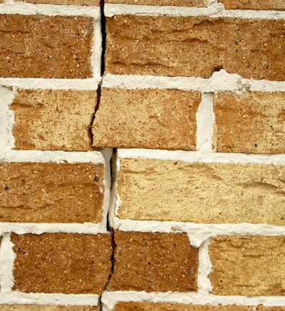 Cracked bricks may be a sign of underlying foundation problems.