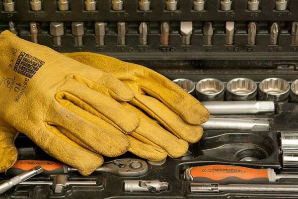 Gloves and other tools that one might assume are needed for DIY foundation repair.
